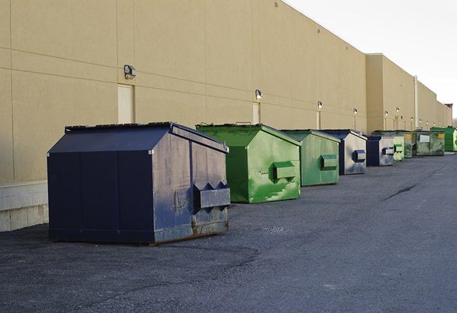 a view of a dumpster truck on a construction site in Affton MO